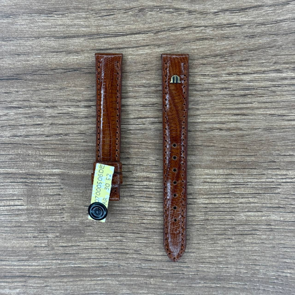 Ремешок для часов Maurice Lacroix из кожи ящерицы, коньячный, 13 мм ML600-000094 Кожаные ремешки - стильные, надёжные и долговечные, способные составить достойную пару часам со стальным корпусом или часам из титана. Аксессуары из кожи не рекомендуется использовать в воде. 
У нас присутствуют только высококачественные материалы и оригинальный товар от производителя.
