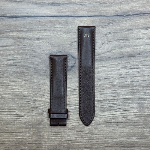 Ремешок для часов Maurice Lacroix  из кожи теленка, темно-коричневый, 20/18 Подходит для часов: EL1088, EL1087.
Ремешок поставляется без застежки.
Кожаные ремешки - стильные, надёжные и долговечные, способные составить достойную пару часам со стальным корпусом или часам из титана.  Аксессуары из кожи не рекомендуется использовать в воде.
У нас присутствуют только высококачественные материалы и оригинальный товар от производителя. Ещё могут подойти ML450-005004;ML740-000048;ML500-000002;ML740-005010;ML740-000076;ML740-005010;ML450-000360;ML740-000080;
