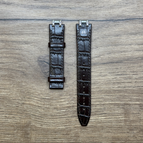 Ремешок для часов Maurice Lacroix из кожи теленка, имитация крокодила, коричневый, 17/16 мм Кожаные ремешки - стильные, надёжные и долговечные, способные составить достойную пару часам со стальным корпусом или часам из титана. Аксессуары из кожи не рекомендуется использовать в воде. У нас присутствуют только высококачественные материалы и оригинальный товар от производителя.