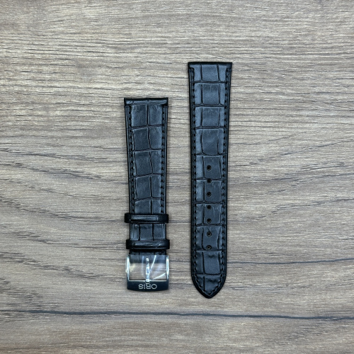 Кожаный ремешок для часов Oris черного цвета, с застежкой из нержавеющей стали Кожаные ремешки - стильные, надёжные и долговечные, способные составить достойную пару часам со стальным корпусом или часам из титана. Аксессуары из кожи не рекомендуется использовать в воде. У нас присутствуют только высококачественные материалы и оригинальный товар от производителя.