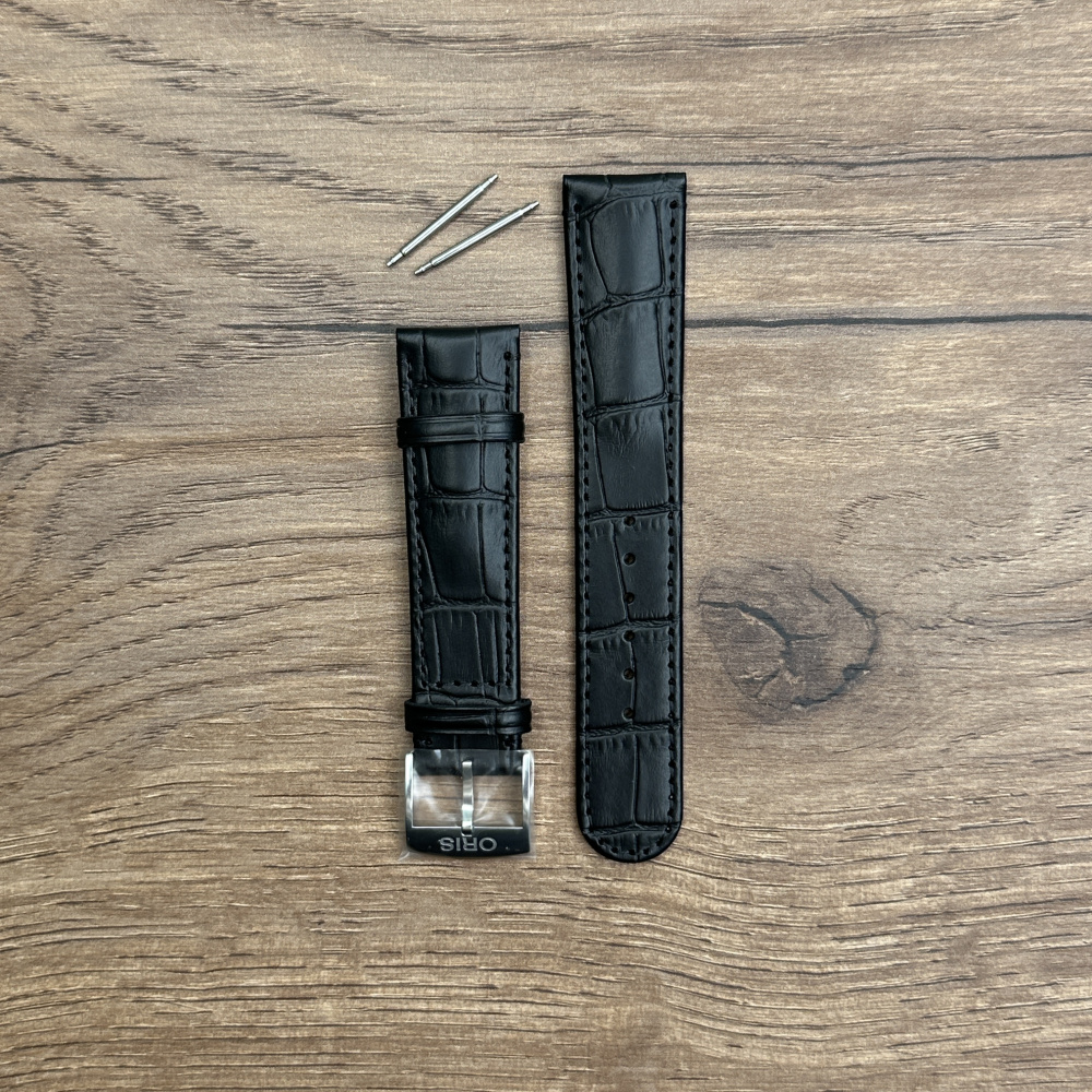 Ремешок для часов Oris из натуральной кожи, черный, с пряжкой 07 5 20 53 Кожаные ремешки - стильные, надёжные и долговечные, способные составить достойную пару часам со стальным корпусом или часам из титана. Аксессуары из кожи не рекомендуется использовать в воде. У нас присутствуют только высококачественные материалы и оригинальный товар от производителя.