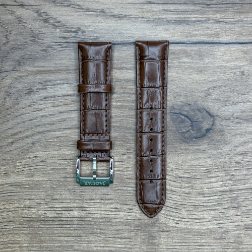 Ремешок для часов Jaguar из кожи теленка, коричневый, для J968 22мм Кожаные ремешки - стильные, надёжные и долговечные, способные составить достойную пару часам со стальным корпусом или часам из титана. Аксессуары из кожи не рекомендуется использовать в воде. У нас присутствуют только высококачественные материалы и оригинальный товар от производителя.