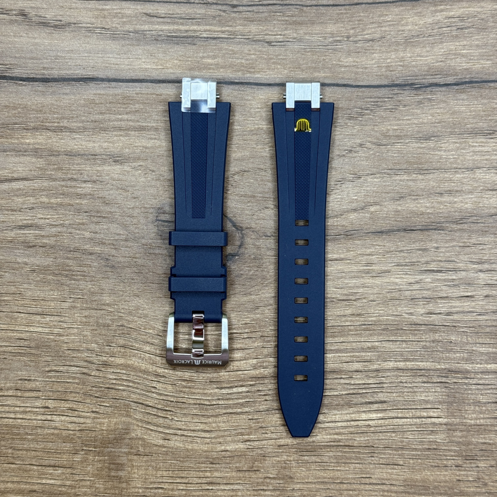 Ремешок для часов Maurice Lacroix, каучук, синий, 21/16, для моделей AI1106, AI6006 ML812-005061 Каучуковые ремешки идеально подходят для активного образа жизни. Они легче и теплее металлических браслетов, а ощущаются на руке как вторая кожа. Большое преимущество каучука в том, что он не боится воды. У нас присутствуют только высококачественные материалы и оригинальный товар от производителя